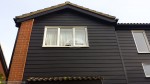 Hardiplank cladding with UPVC Black Ash fascias and soffits Oxford