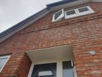 White soffits and anthracite fascia boards