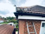 White fascia and soffit with black guttering new installation