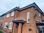 White fascia and soffit with black guttering new installation