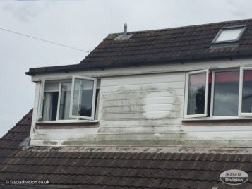 Before replacement of the old cladding on dormer window