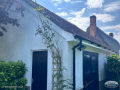 New white fascia, soffits and black guttering