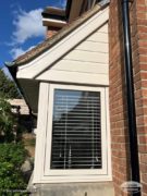 Bay windows with Cream flush fit uPVC casement window in cream with uPVC cladding