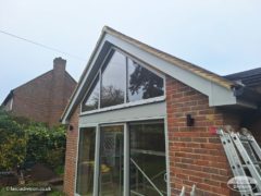 Agate grey fascia and soffit black continuous guttering