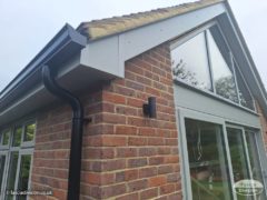 Agate grey fascia and soffit black continuous guttering