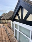 Black fascia, soffits and mock Tudor on a gable end