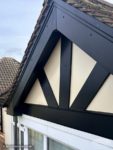 Black fascia, soffits, guttering and mock Tudor