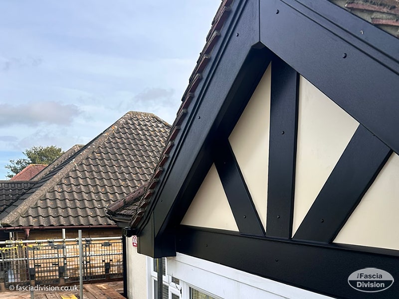 Black fascia, soffits, guttering and mock Tudor