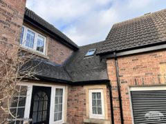 New black ash fascia and soffit with black guttering