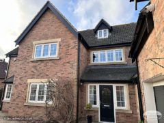 Black ash UPVC fascia and soffit with black square guttering