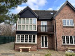 New fascias, soffits, guttering and midnight black Hardie Plank cladding